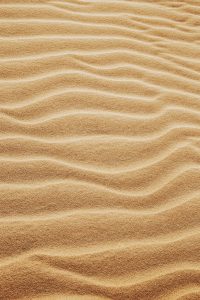 fine sandy dunes in dry desert